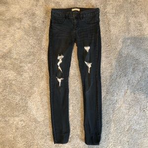 Ripped distressed style skinny jeans